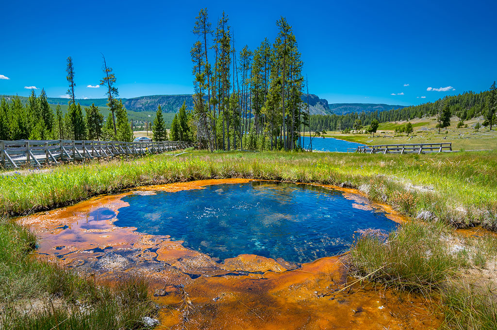 Yellowstone National Park - Gem pool and Pinto Spring in the Cascade Geyser group viewpoint, West Gate, Wyoming